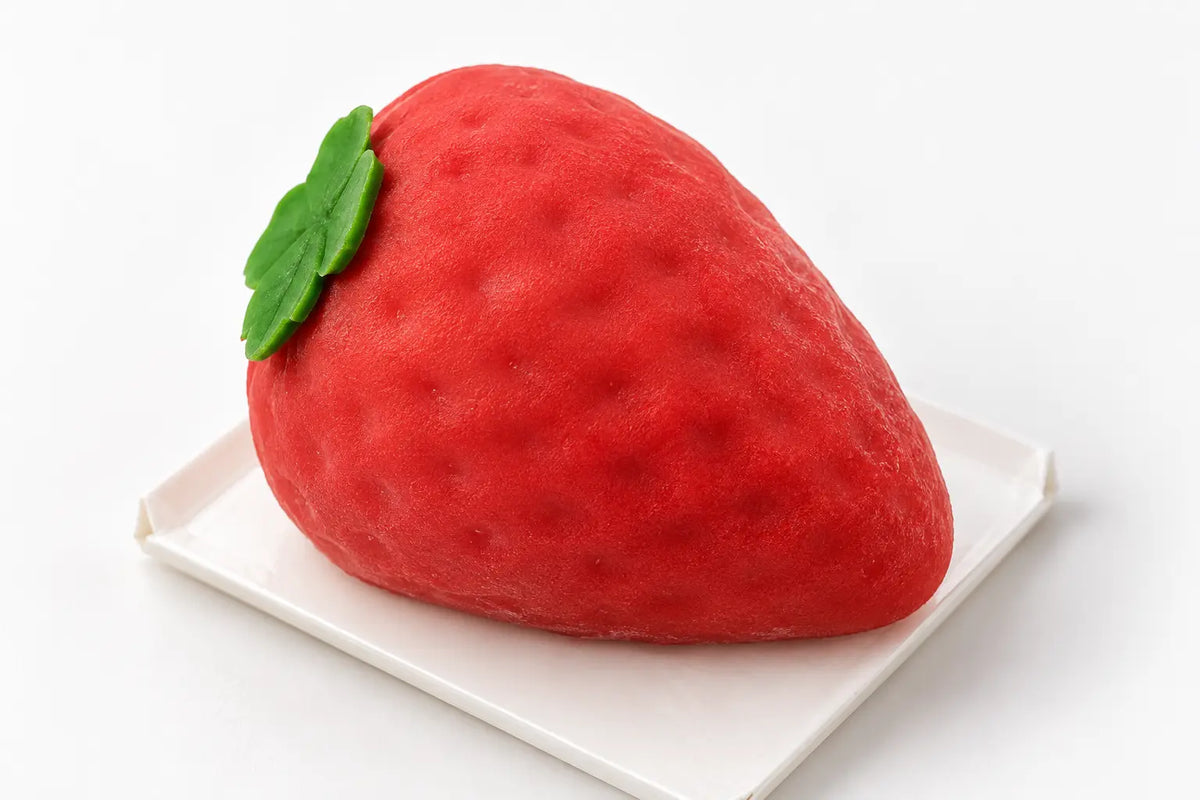 Strawberry-shaped frozen dessert close-up