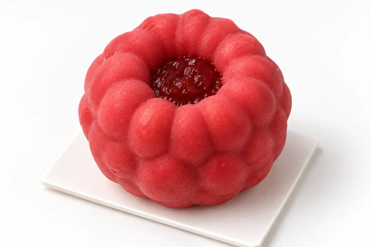 Raspberry-shaped frozen dessert close-up